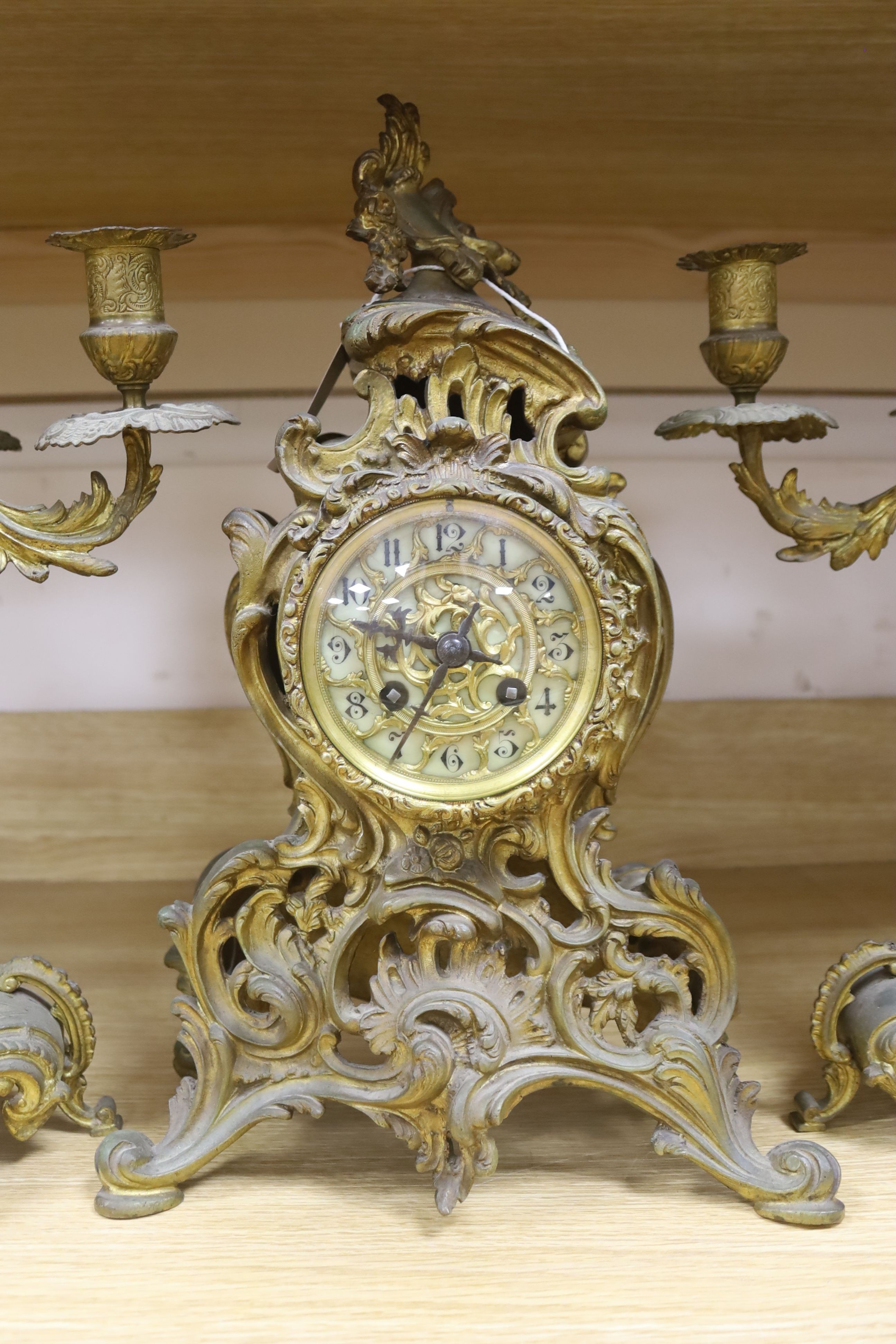 A 19th century French ormolu clock garniture, height 40cm